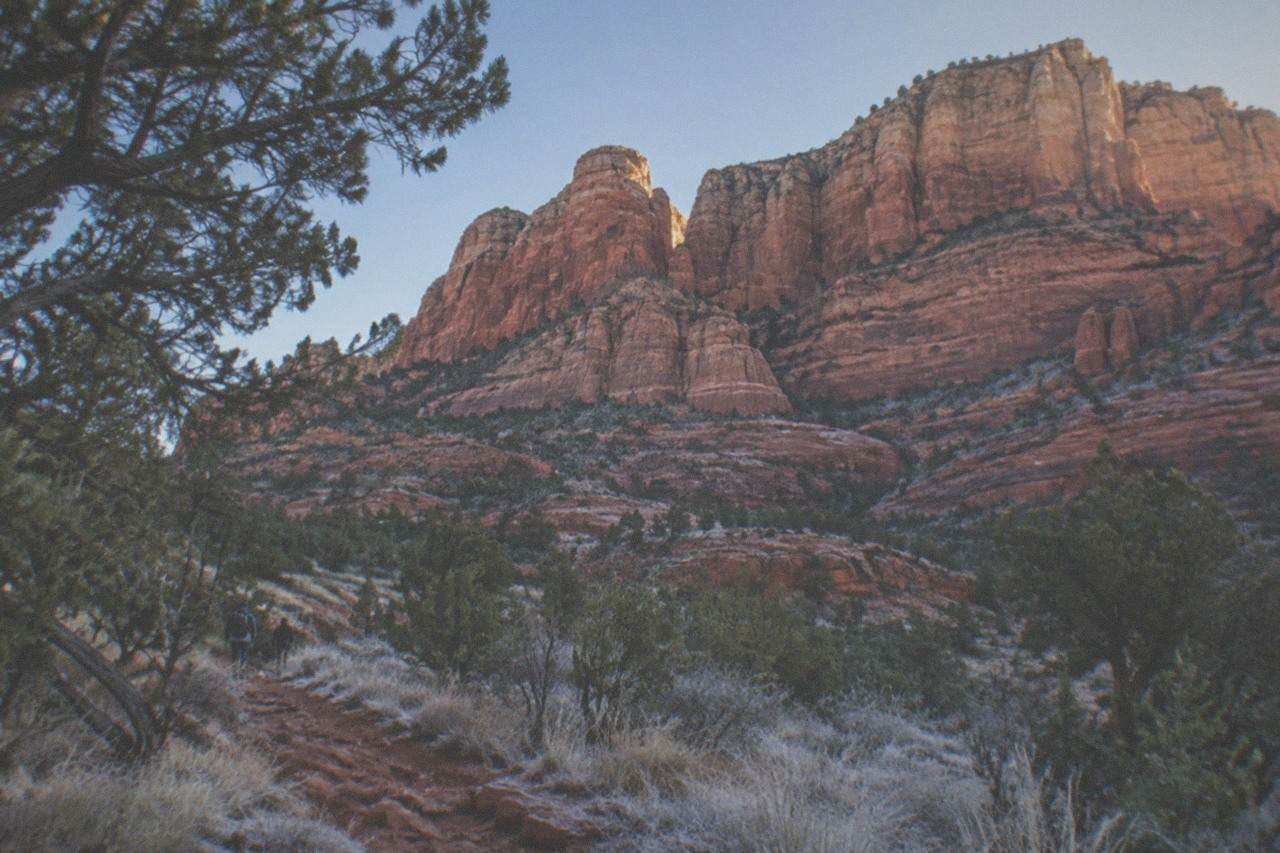 Red rock cliffs and canyon walls in Arizona under morning light