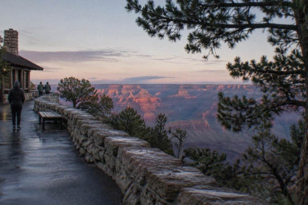 Grand Canyon South Rim wall of layered rock descending toward the inner canyon in morning light