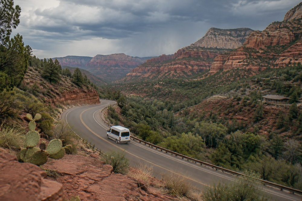 Red rock cliffs and canyon landscape along an Arizona day tour route