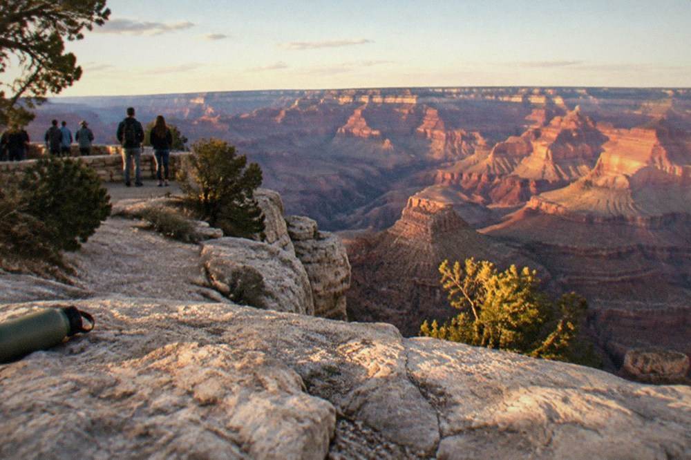 Layered canyon walls at a Grand Canyon South Rim viewpoint in late afternoon light