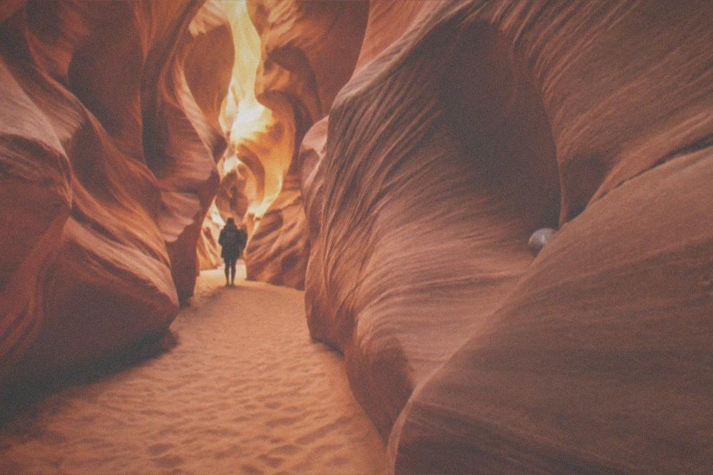 Empty red sandstone slot canyon walls glowing in late afternoon light