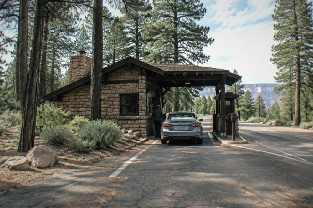 Entrance station and pine forest at the South Rim entrance to Grand Canyon National Park