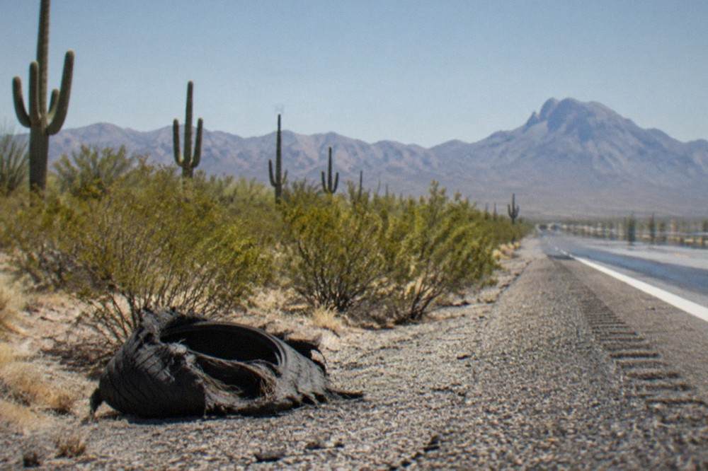 Saguaro cacti and desert scrub along the interstate highway south of Phoenix